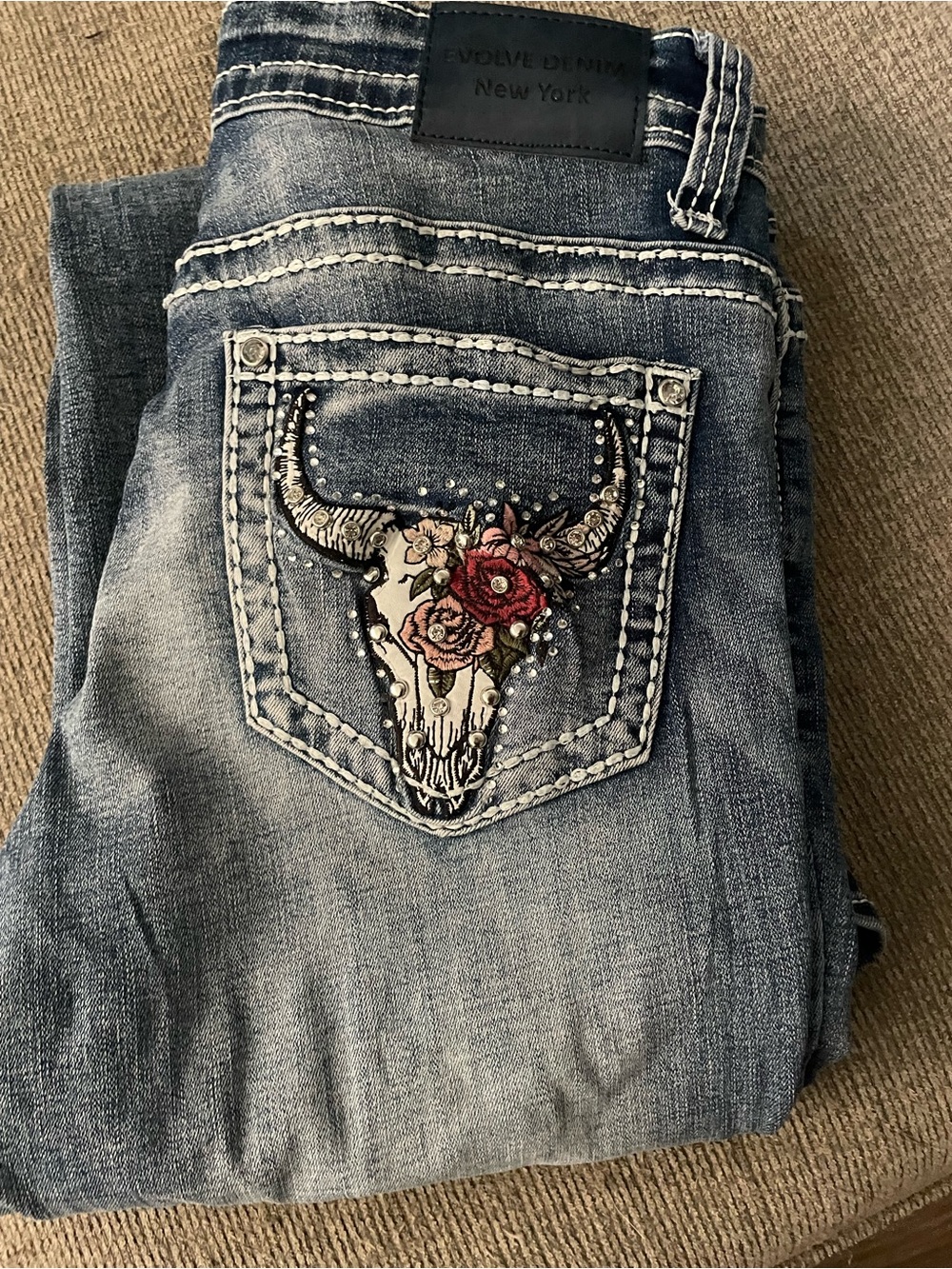 Women’s Distressed Blue Embroidered Pocket Jeans -